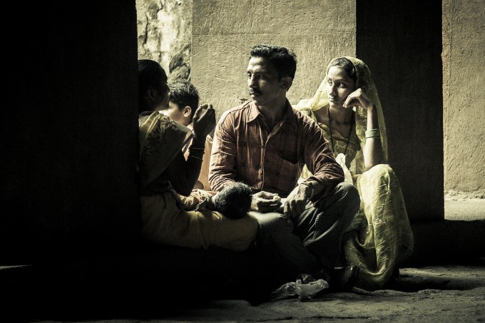 Family moment. Elephanta Island, Maharashtra. India